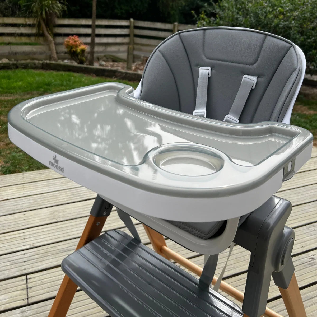 Grey MOOSE Frankie Foldable High Chair with a removable tray insert, padded seat and five-point harness.